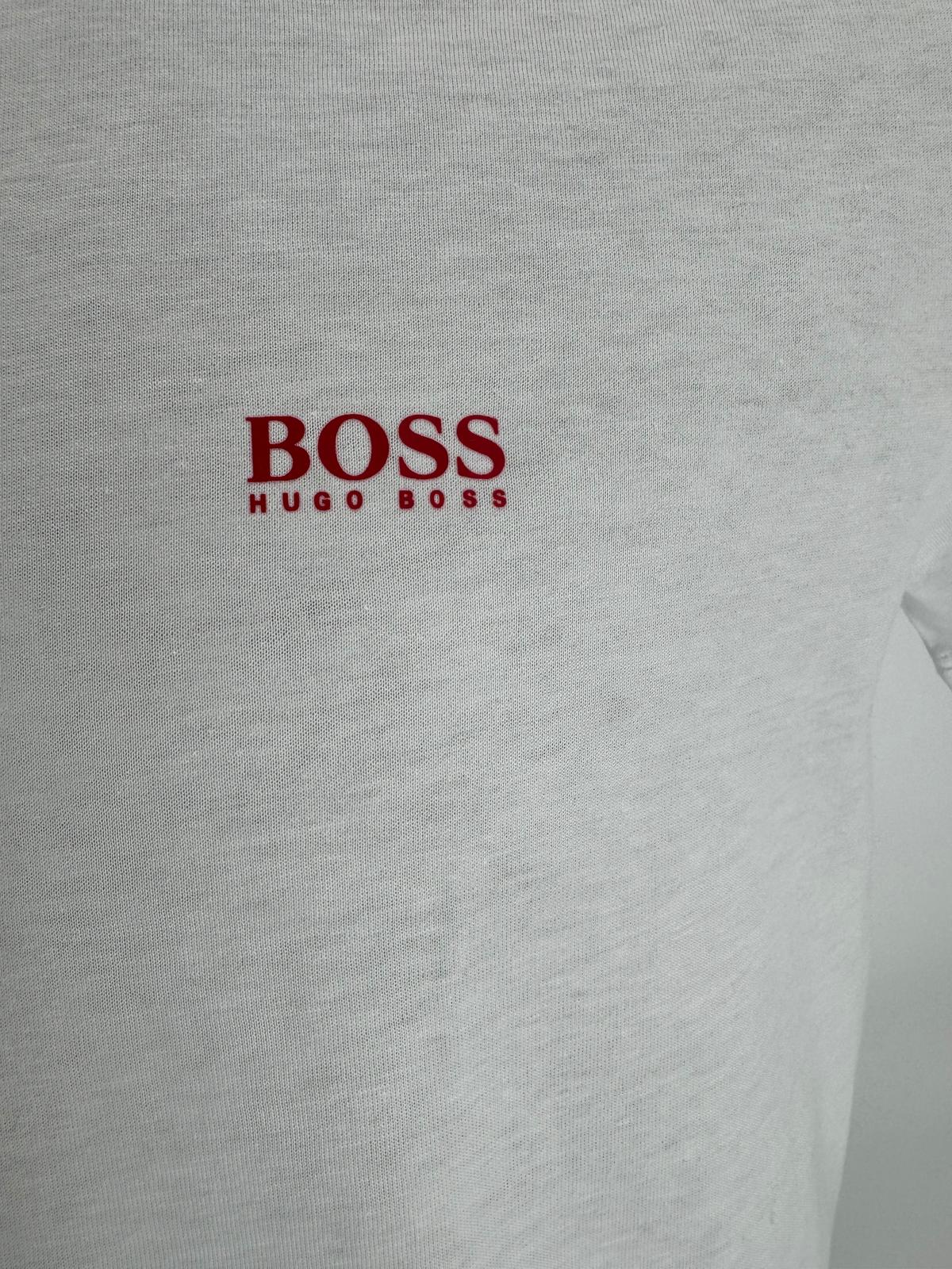 A regular-fit T-shirt by HUGO BOSS. Featuring coordinating logo at the left chest, this short-sleeved T-shirt is crafted in pure-cotton jersey for natural comfort and breathability.