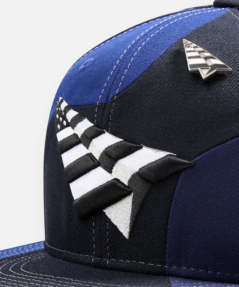 Paper Plane black multi Planes Spiral 9Fifty snapback with 3D embroidered flag logo and removable pin.