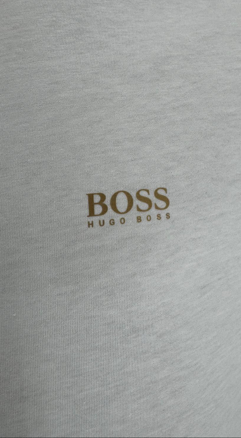 A regular-fit T-shirt by HUGO BOSS. Featuring coordinating logo at the left chest, this short-sleeved T-shirt is crafted in pure-cotton jersey for natural comfort and breathability.