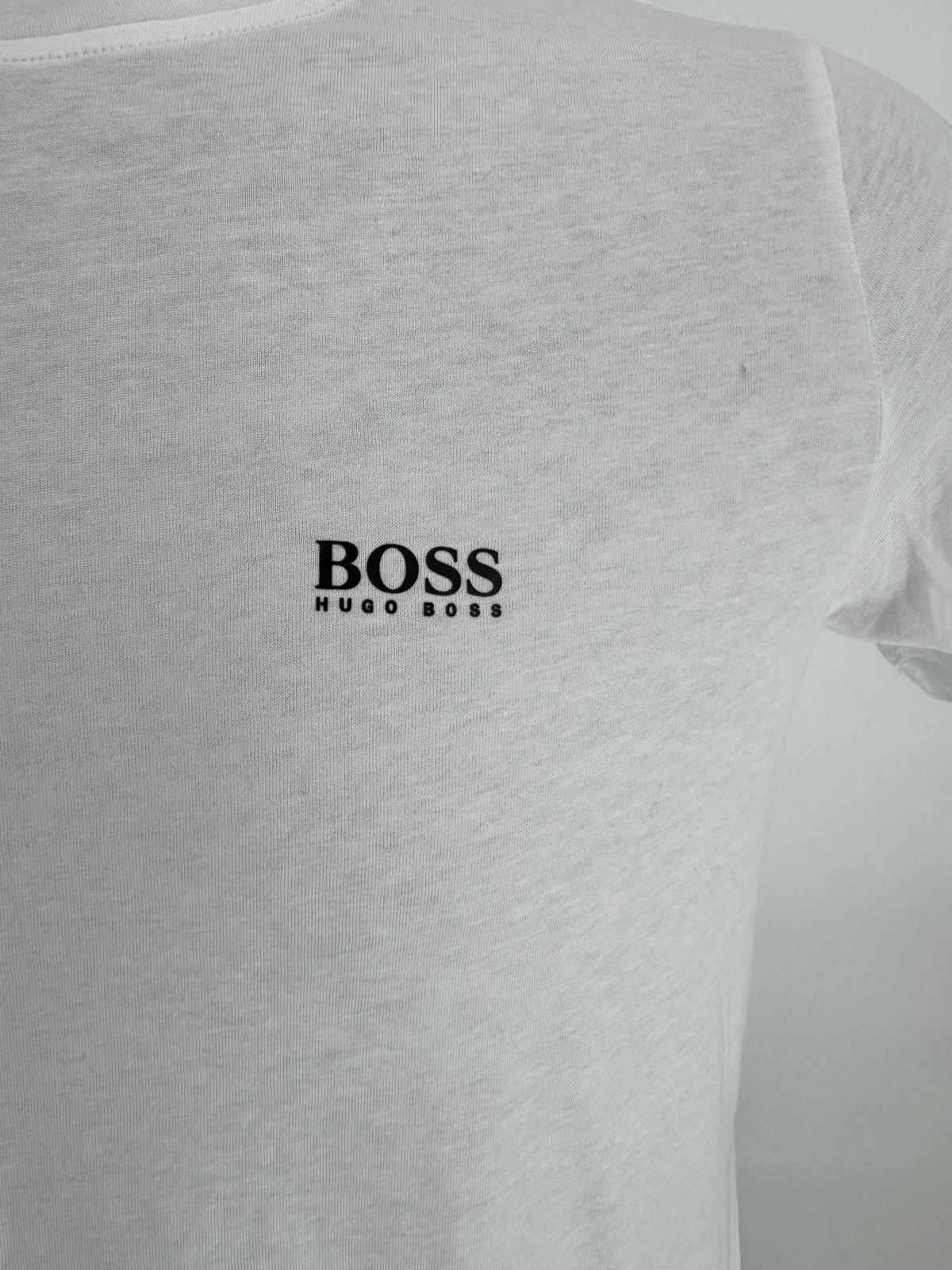 A regular-fit T-shirt by HUGO BOSS. Featuring coordinating logo at the left chest, this short-sleeved T-shirt is crafted in pure-cotton jersey for natural comfort and breathability.