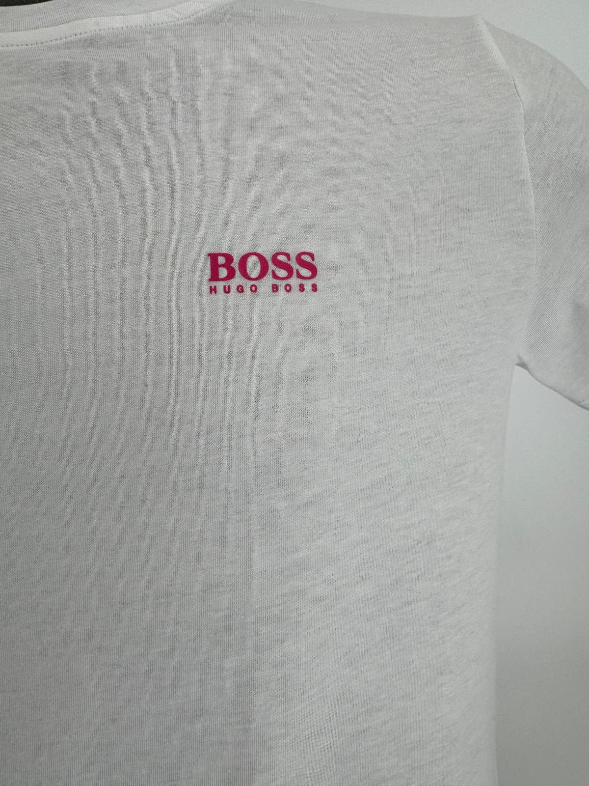 A regular-fit T-shirt by HUGO BOSS. Featuring coordinating logo at the left chest, this short-sleeved T-shirt is crafted in pure-cotton jersey for natural comfort and breathability.