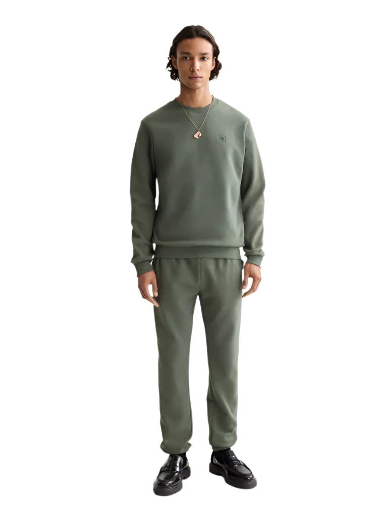 Scotch & Soda regular fit sweatshirt in neutral tone with minimalist chest logo laid flat