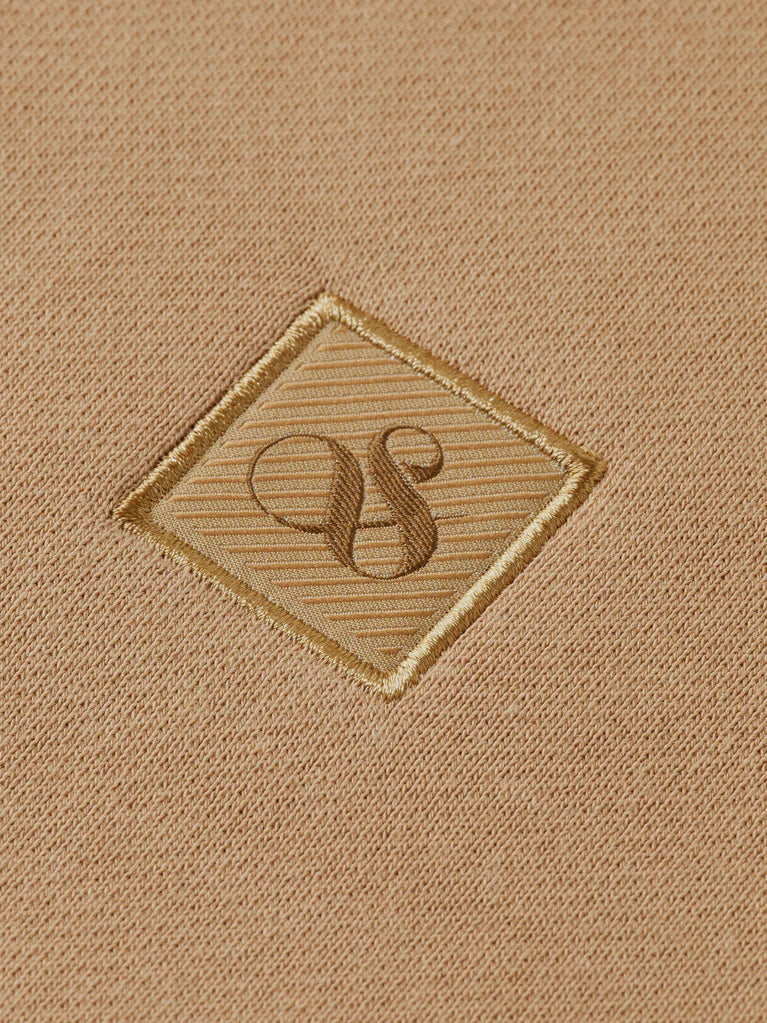 Scotch & Soda regular fit hoodie with subtle chest logo badge.