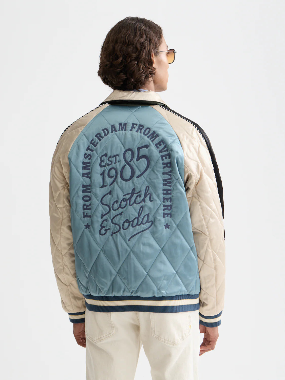 Scotch & Soda 40th Anniversary reversible souvenir bomber jacket with embroidered artwork.