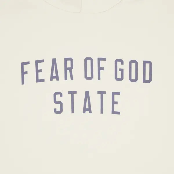 Essentials State Fleece Hoodie in shell color with logo detailing and relaxed fit.