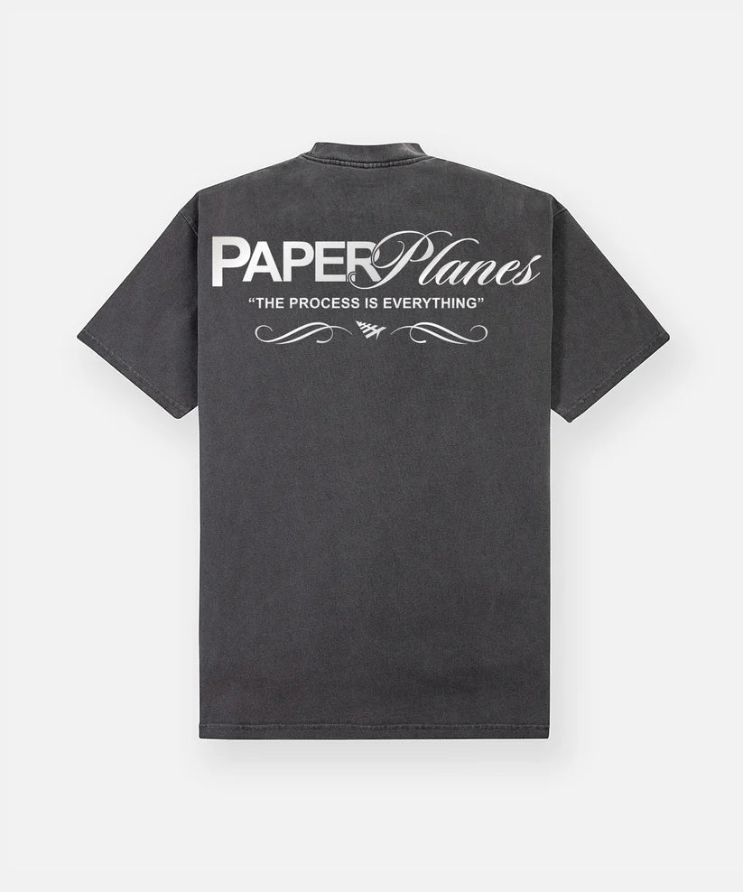 washed black paper planes process heavyweight oversized tee with screenprint graphics laid flat