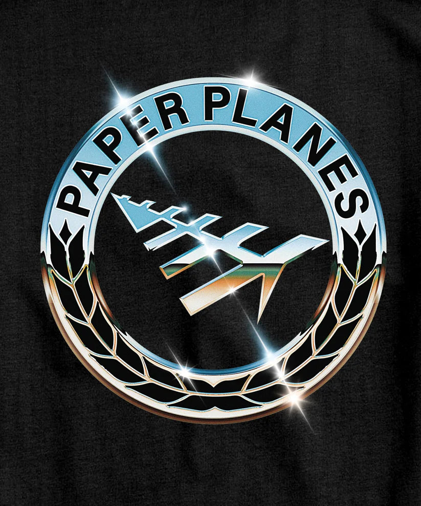 White Paper Planes First Class Chrome Tee featuring puff print and Plastisol logo on left body.