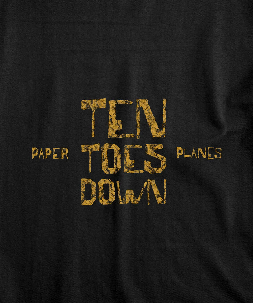 Paper Plane Ten Toes Down T-shirt in black with front screenprint graphic and ribbed crew neckline.