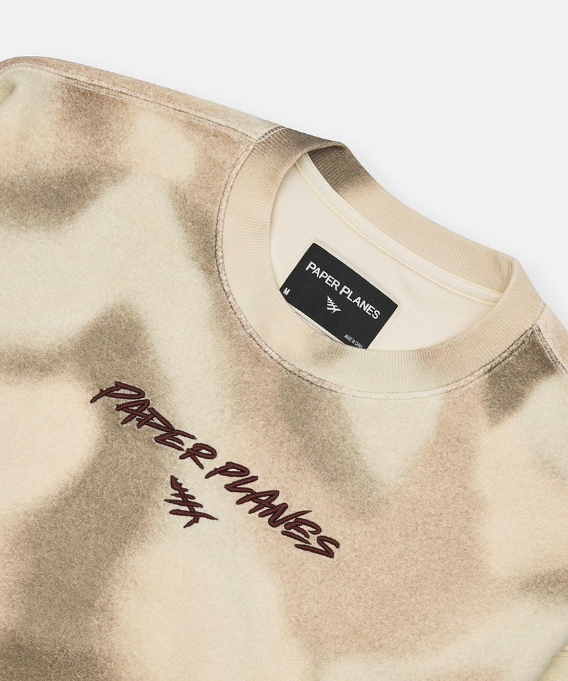 Paper Planes Airbrushed Camo Crewneck in multi-color with embroidered front detail and silicone flag, oversized fit.