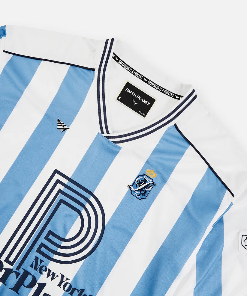 Classic Football Shirts x Paper Planes soccer jersey featuring allover stripes, embroidered details, mesh fabric, and relaxed football-inspired streetwear fit.