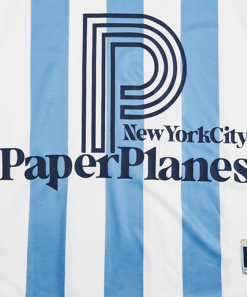 Classic Football Shirts x Paper Planes soccer jersey featuring allover stripes, embroidered details, mesh fabric, and relaxed football-inspired streetwear fit.