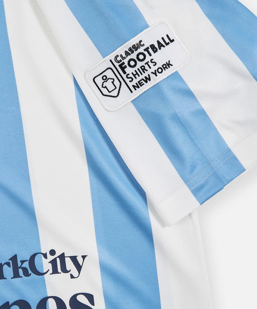 Classic Football Shirts x Paper Planes soccer jersey featuring allover stripes, embroidered details, mesh fabric, and relaxed football-inspired streetwear fit.