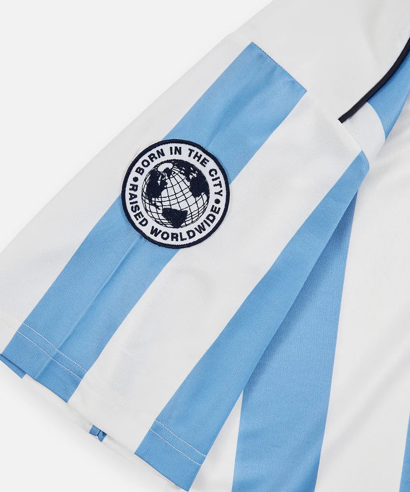 Classic Football Shirts x Paper Planes soccer jersey featuring allover stripes, embroidered details, mesh fabric, and relaxed football-inspired streetwear fit.