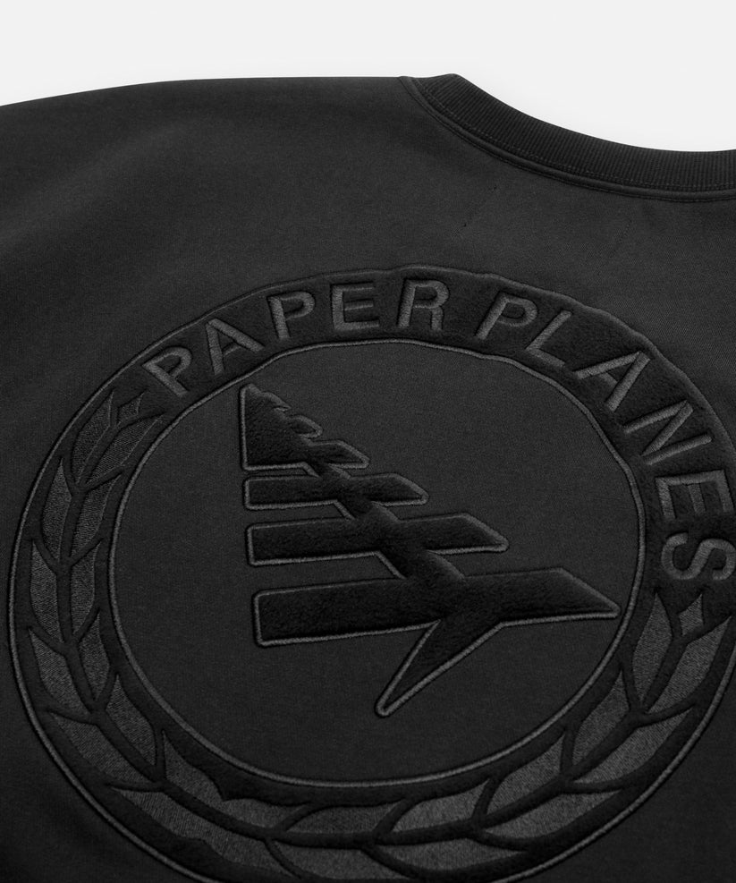 Paper Planes Relaxed FC Crewneck Sweatshirt in fleece with embroidered front, 3D applique back detail, and silicone flag.