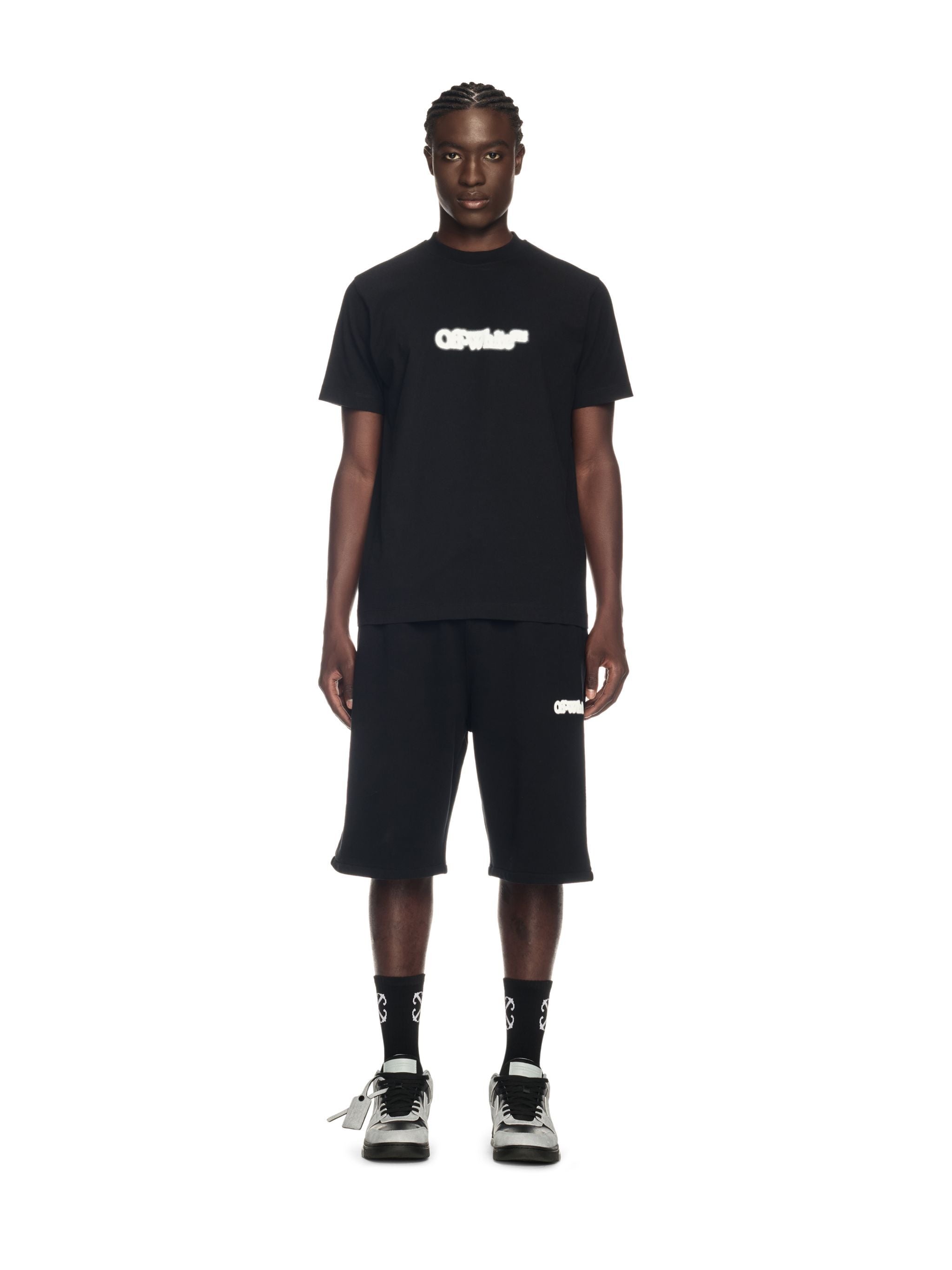 Off-White Spray Arrow slim fit short-sleeve t-shirt with a bookish logo on the front and sprayed arrow graphic on the back.