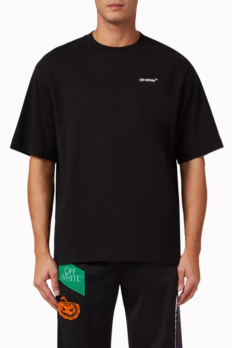 Off-White Chain Arrow Skate T-shirt in black with chest logo print and chainlink arrow graphic on the back.
