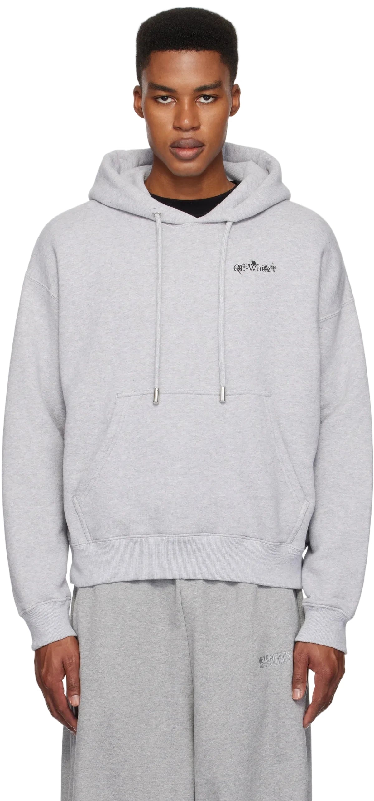 Off-White Flower Arrow Skate hoodie in light grey with arrow and floral graphic, drawstring hood, and kangaroo pocket.