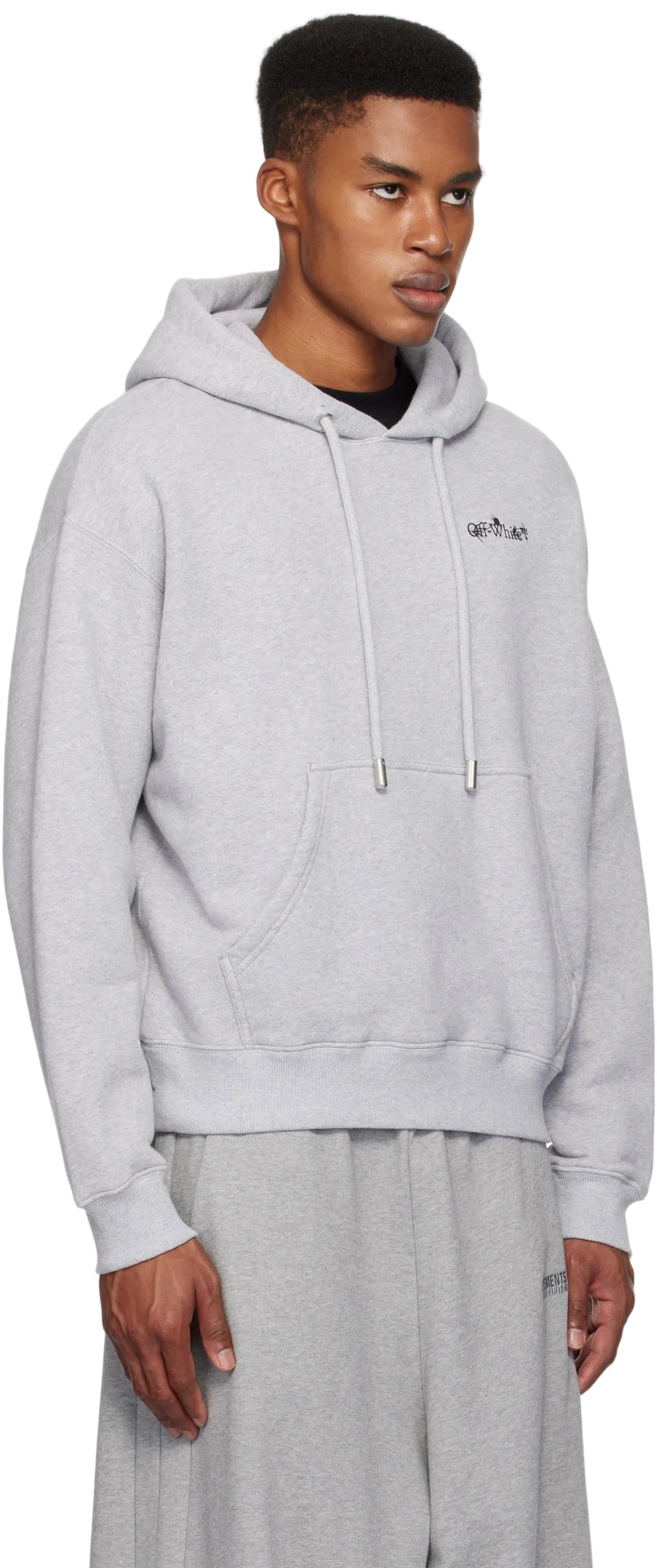 Off-White Flower Arrow Skate hoodie in light grey with arrow and floral graphic, drawstring hood, and kangaroo pocket.