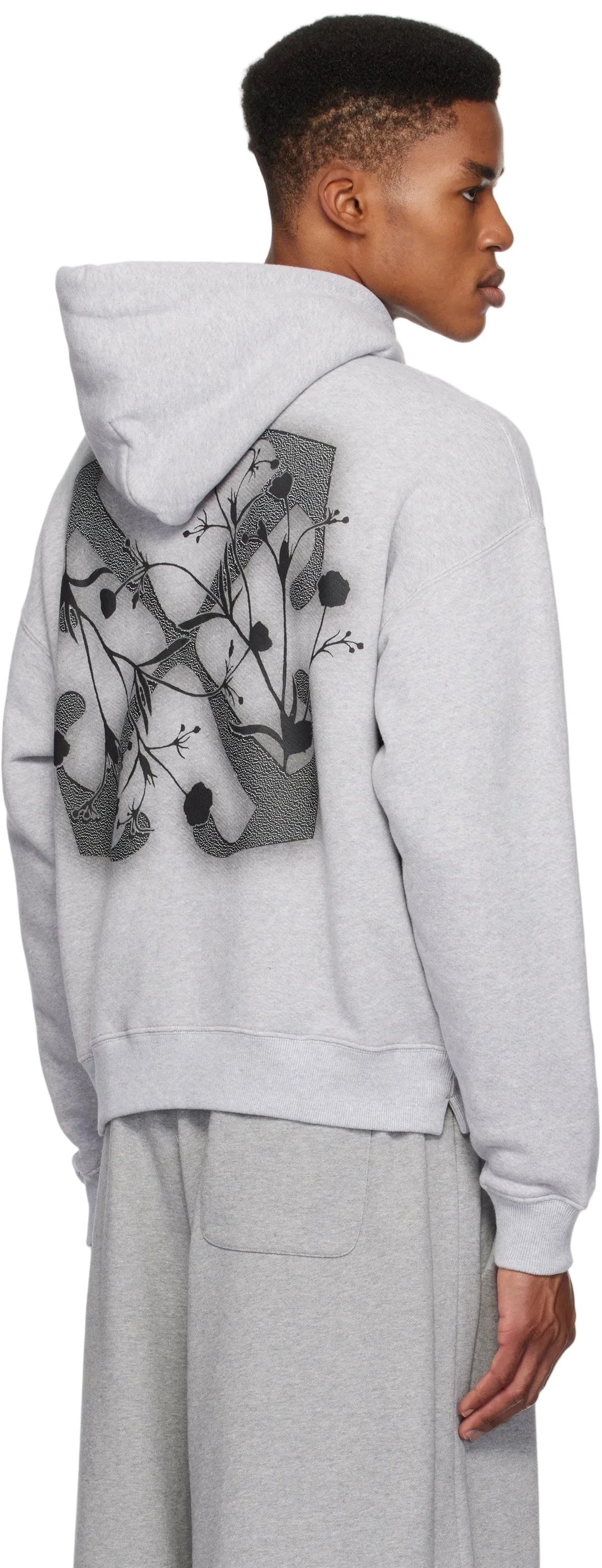 Off-White Flower Arrow Skate hoodie in light grey with arrow and floral graphic, drawstring hood, and kangaroo pocket.