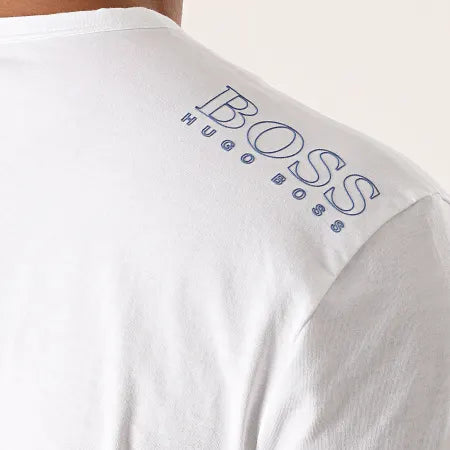 Upgrade your everyday wardrobe with the Hugo Boss Basic Tee (White with Blue Logo) — the perfect blend of minimalism, comfort, and premium designer style