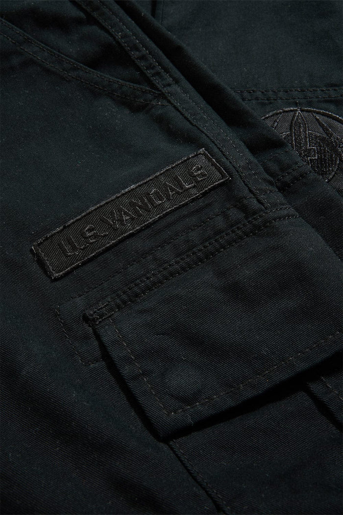 Xavier Prestige Tonal Cargo Pants in cotton with loose hip-to-thigh fit, tapered legs, functional cargo pockets, and tonal embroidered patches