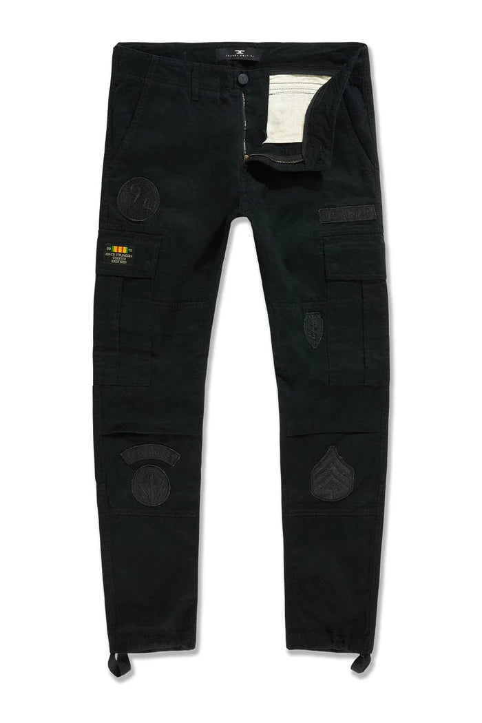 Xavier Prestige Tonal Cargo Pants in cotton with loose hip-to-thigh fit, tapered legs, functional cargo pockets, and tonal embroidered patches