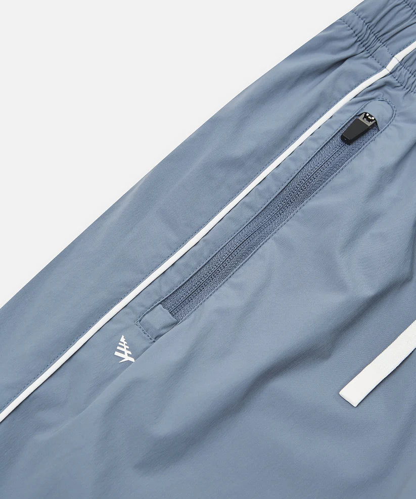 Paper Plane Planes Lounge track pants with corded piping side panels and water-resistant nylon fabric.