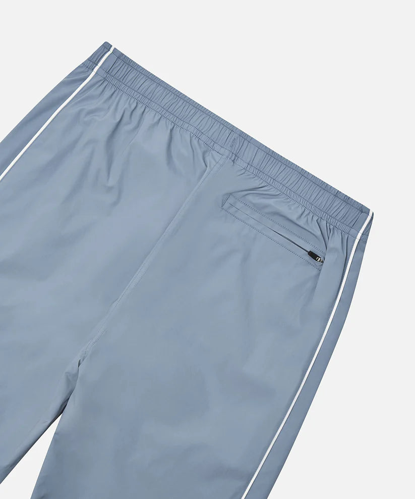 Paper Plane Planes Lounge track pants with corded piping side panels and water-resistant nylon fabric.