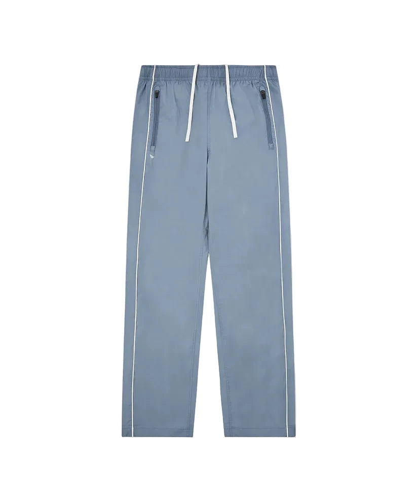 Paper Plane Planes Lounge track pants with corded piping side panels and water-resistant nylon fabric.