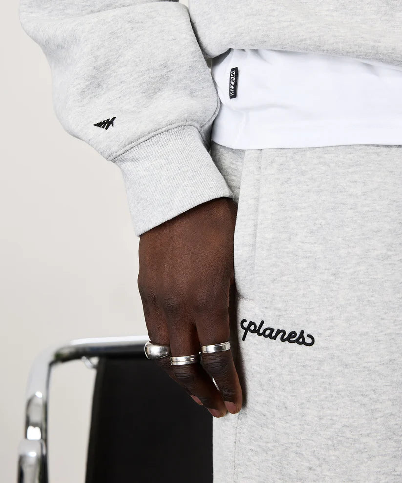 Paper Plane oversized script weld sweatpants with fleece fabric, welded logo detail, and elasticated cuffs.