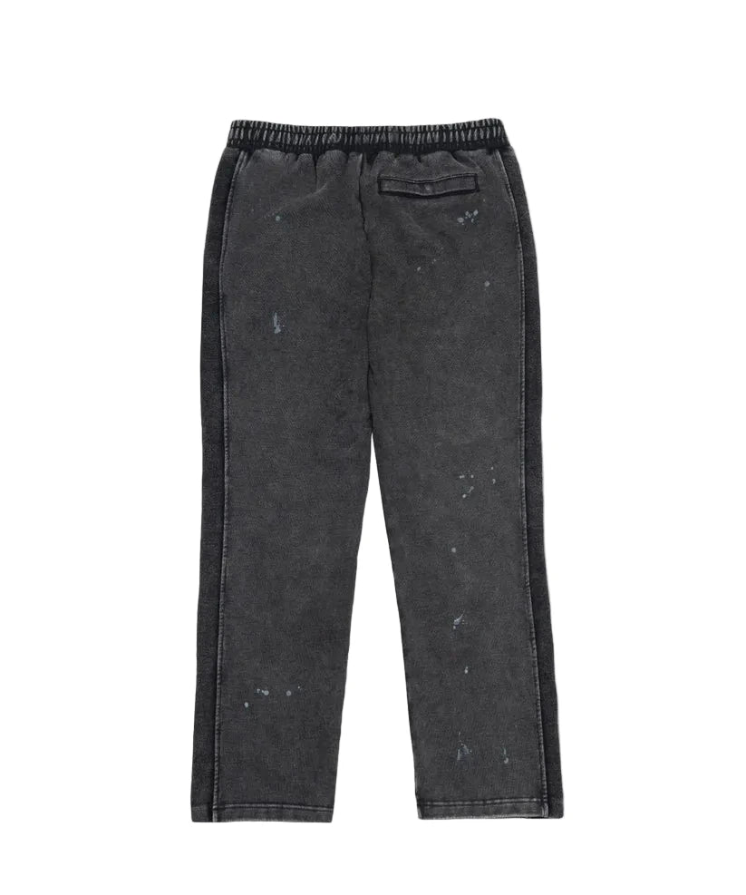 Paper Plane black heavyweight sweatpants with splatter effect, zippered pockets, and elastic waistband.