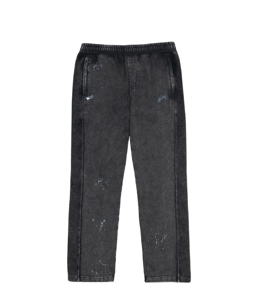 Paper Plane black heavyweight sweatpants with splatter effect, zippered pockets, and elastic waistband.