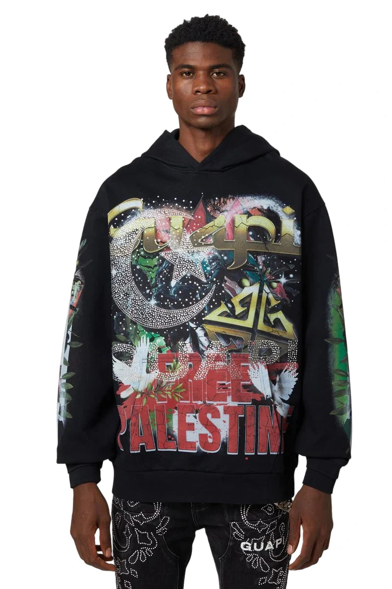 GUAPI Free Palestine Hoodie in black with oversized fit, multicolor front graphic, Dome of the Rock artwork on back, and rhinestone embellishments.