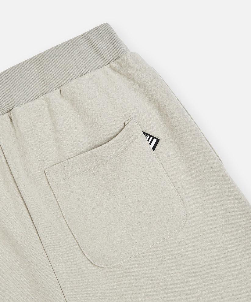 Paper Planes Lockup shorts in grey with heavyweight French Terry cotton, classic fit, silicone logo detail, and hidden media pockets.