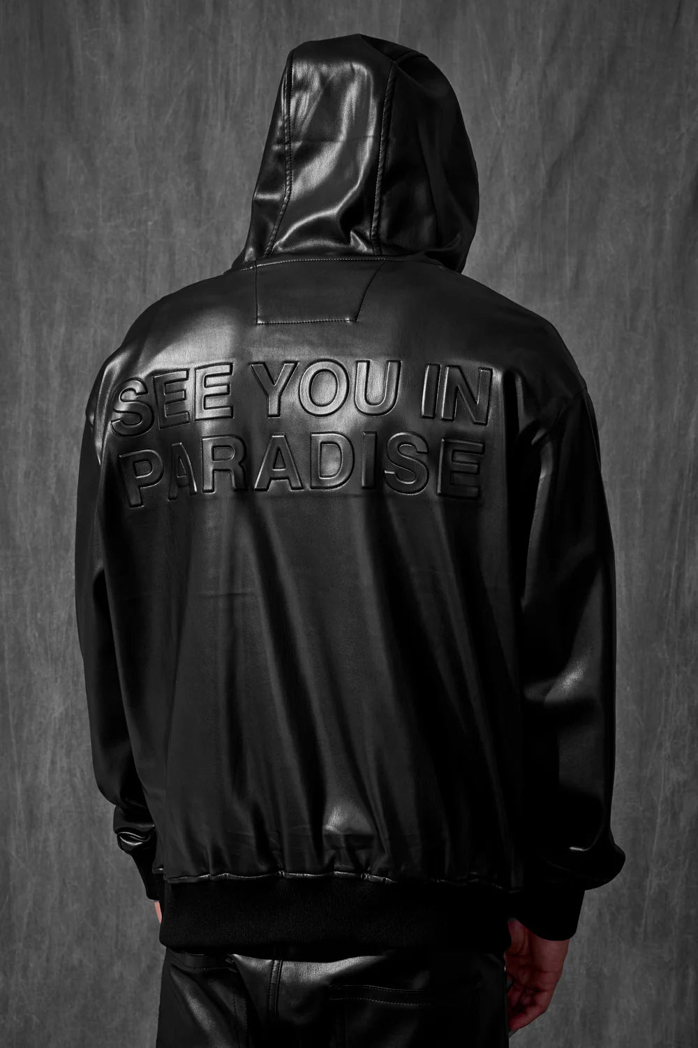 Jordan Craig See You in Paradise hoodie in soft vegan leather with embossed chest and back print, front kangaroo pocket, and ribbed trims.