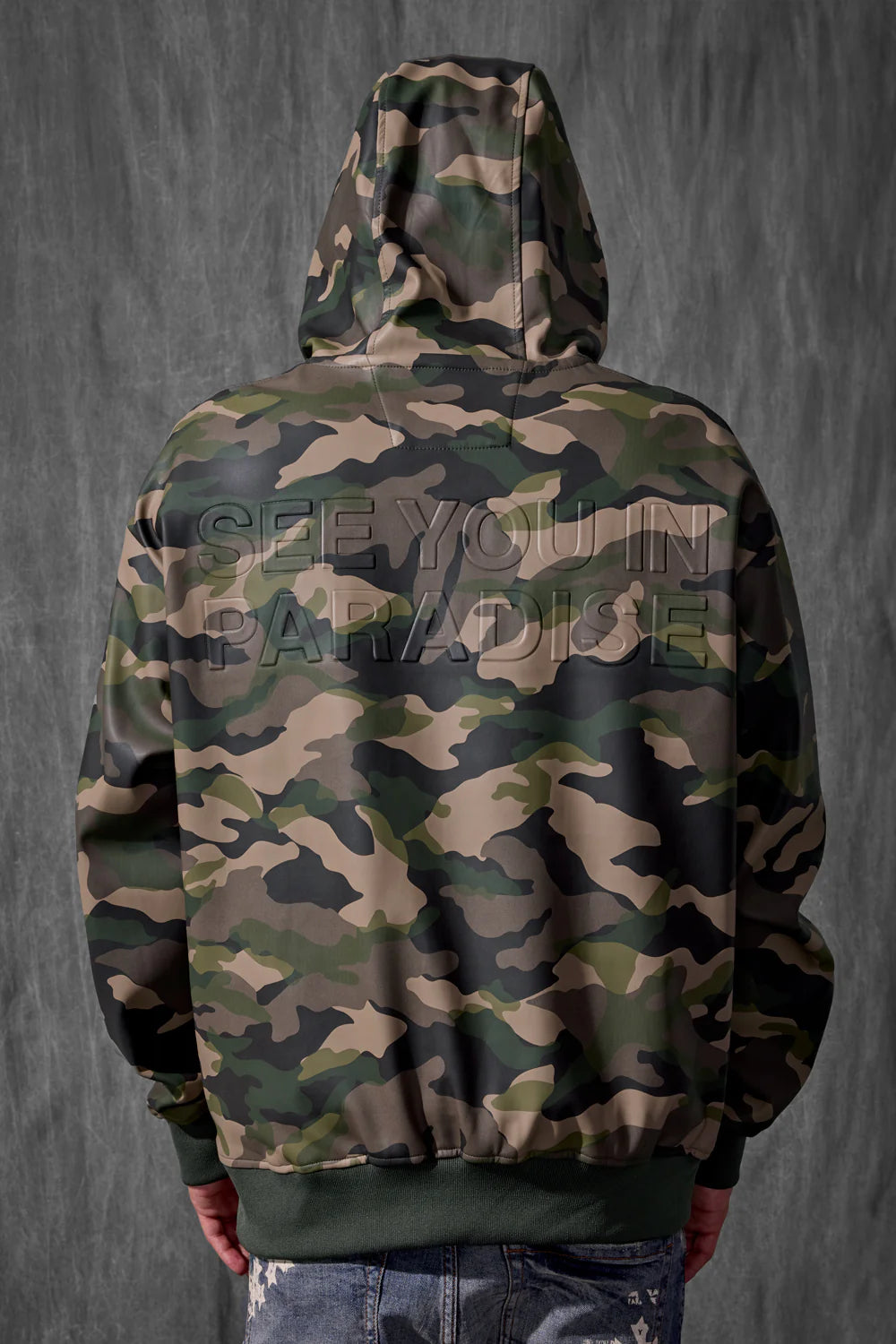 See You in Paradise Vintage Camo hoodie with digital camo print, embossed chest and back logo, vegan leather finish, and kangaroo pocket.