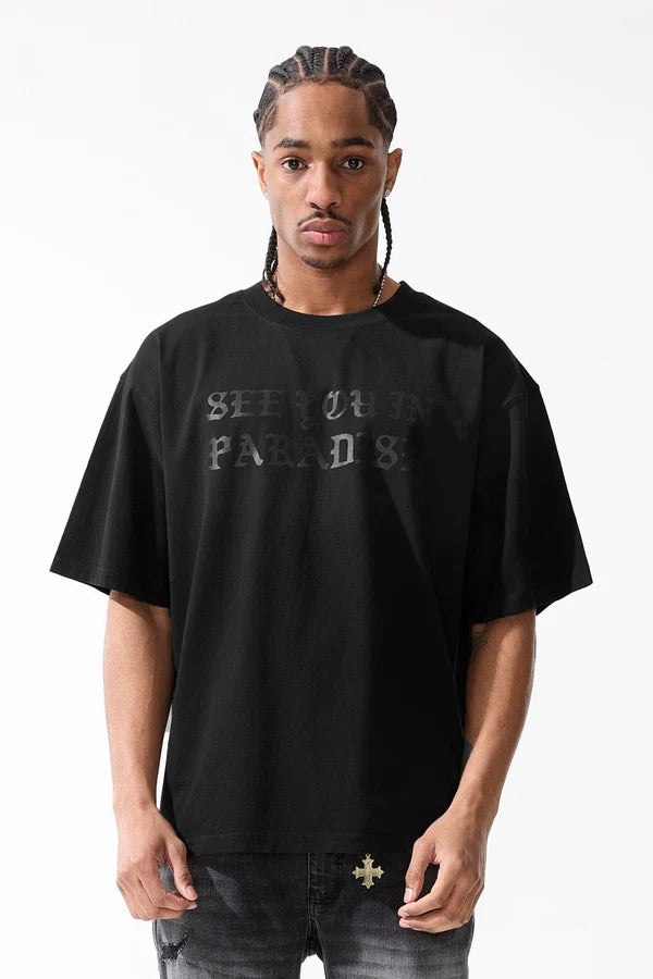 black cropped boxy t-shirt with syip graphic on front and vintage wash laid flat on white background