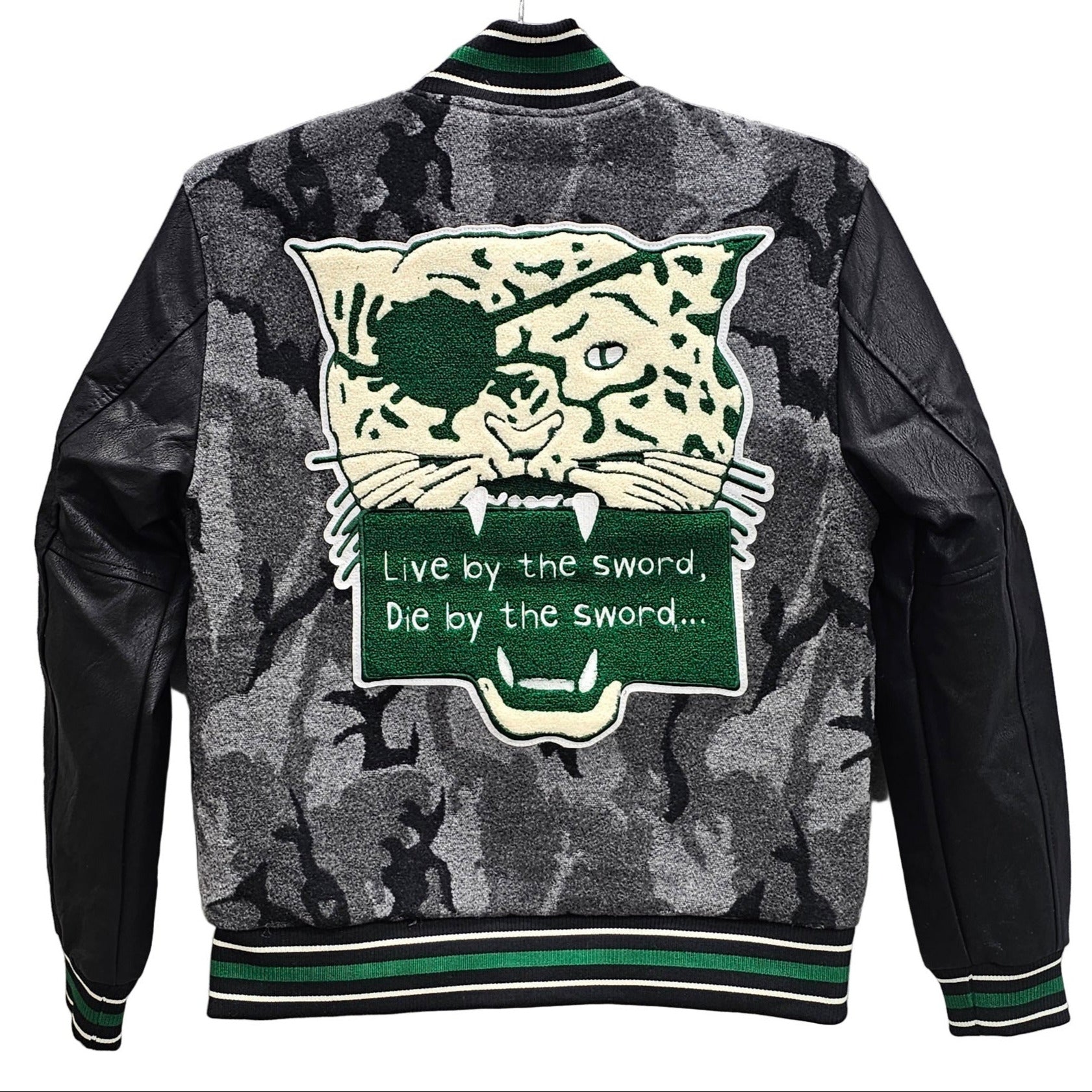 “JORDAN CRAIG Badge Varsity Jacket – Black Camo: wool-blend body, quilted satin lining, vegan leather sleeves, embroidered badges, and snap button front closure.”