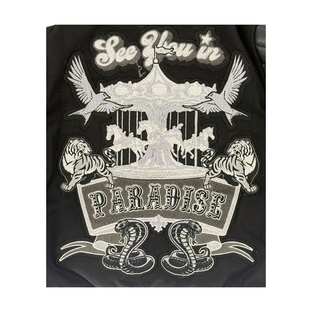 Men’s varsity jacket with wool body, vegan leather sleeves, striped ribbed trims, and embroidered chenille patches