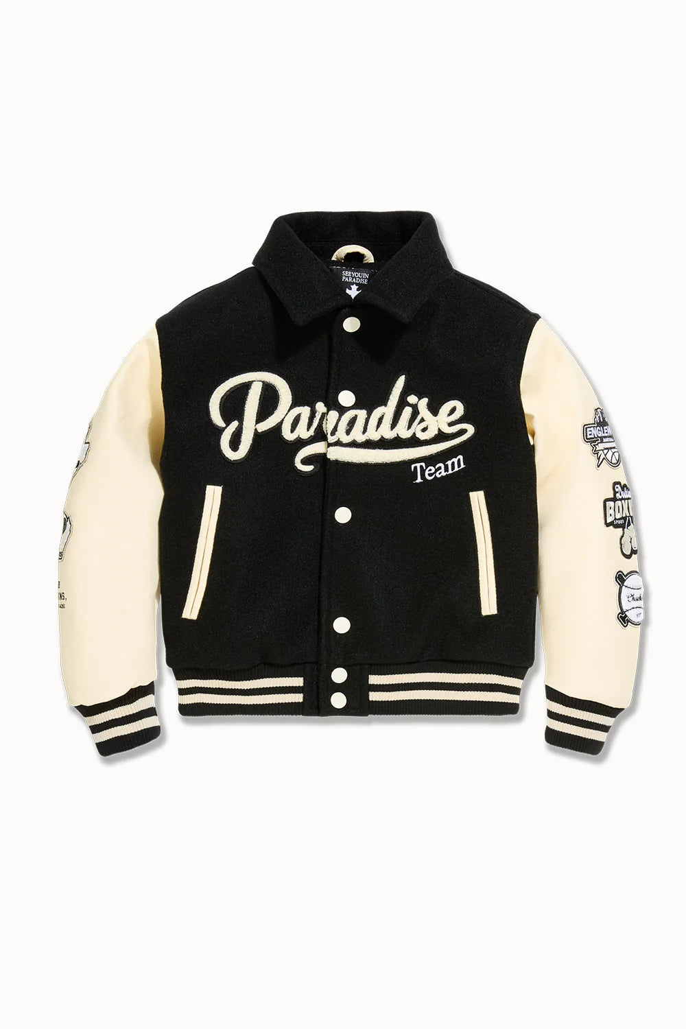 “Paradise Team Varsity Jacket –Black: wool body, quilted satin lining, vegan leather sleeves, chenille patches, embroidered details, and snap button front.”