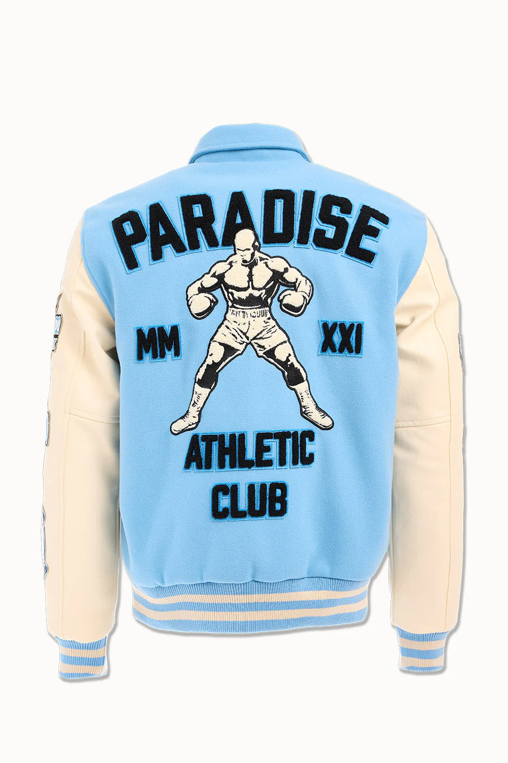 “Paradise Team Varsity Jacket – Sky Blue: wool body, quilted satin lining, vegan leather sleeves, chenille patches, embroidered details, and snap button front.”