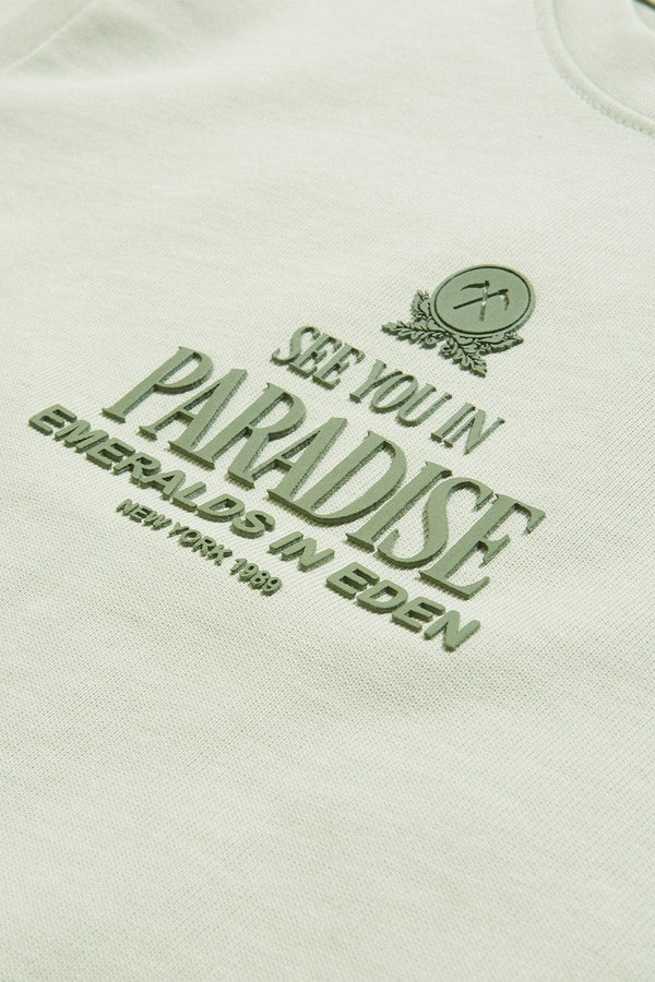 Text 'See You In Paradise, New York 1889' on a light background