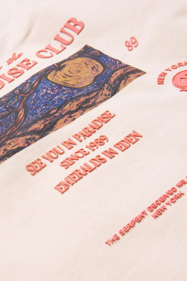 Close-up of a vintage-style sweatshirt with text and graphic design on a beige background