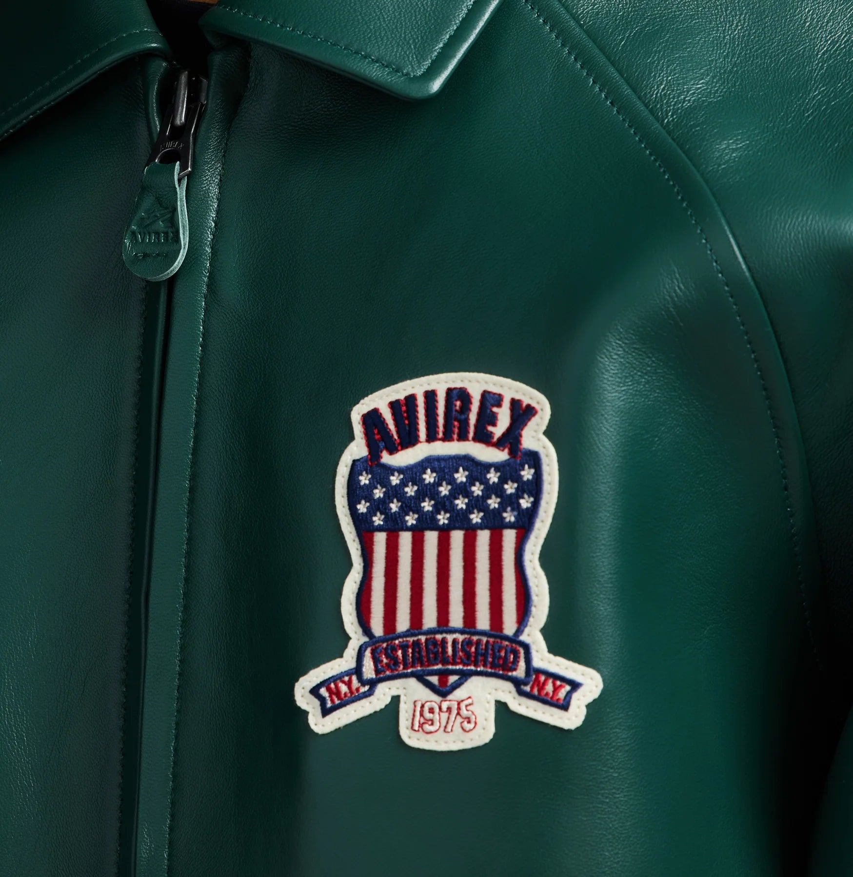 Avirex ICON Jacket in 100% French lamb leather with logo details, front zipper, and striped rib trim