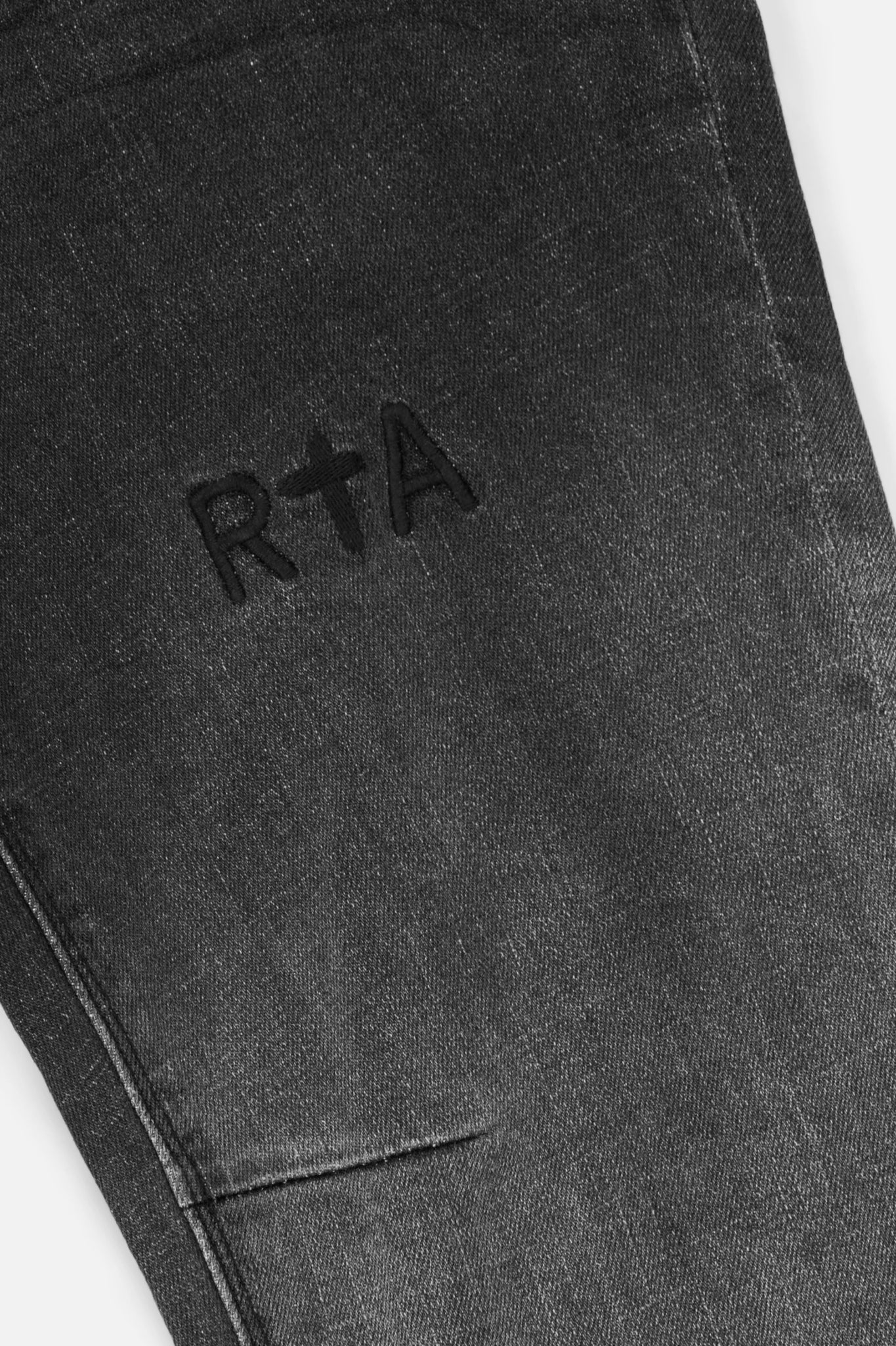 RtA Bryant Skinny Jean in Light Charcoal with gradient fade and logo embroidery