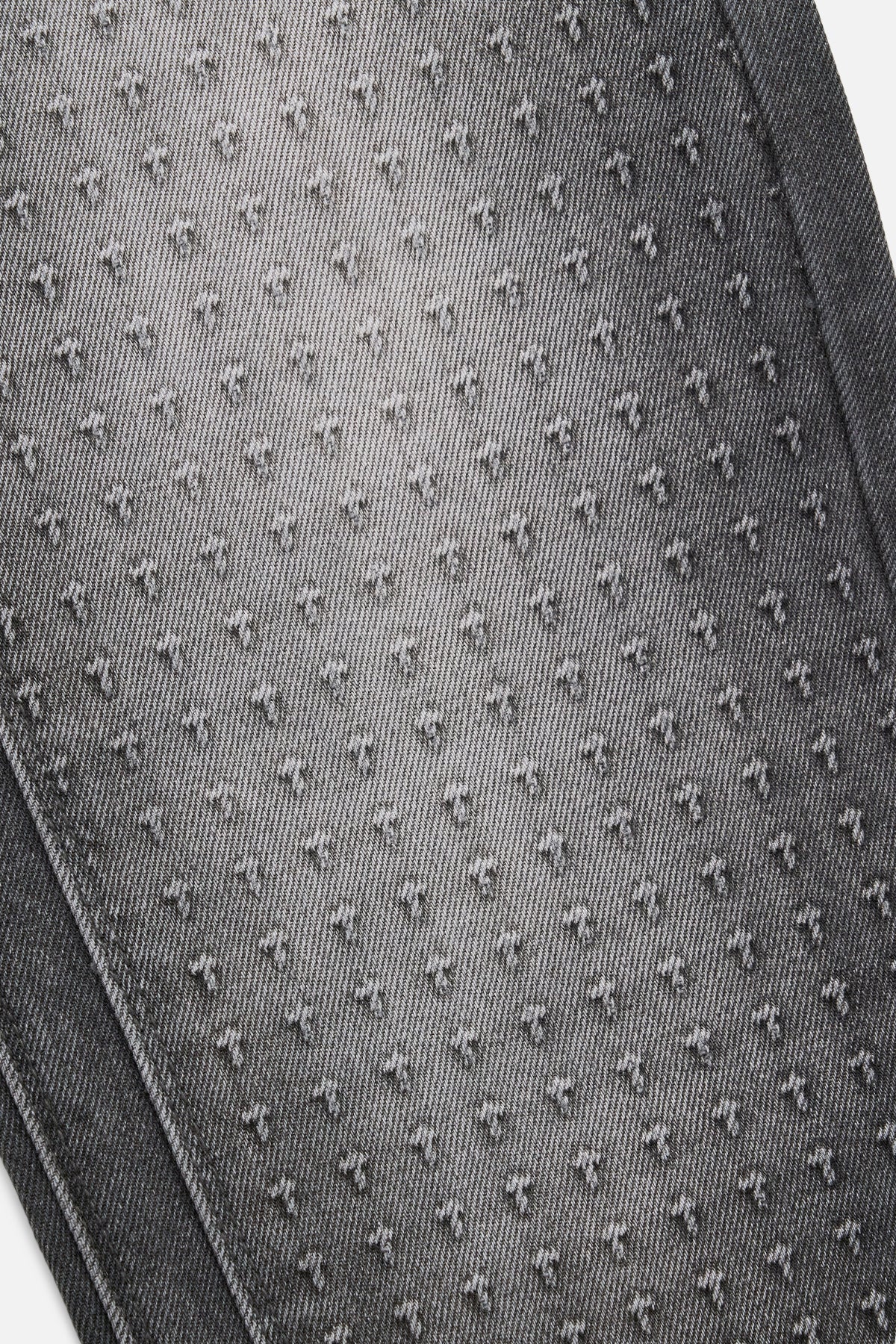 RTA Ricardo Slim Fit Jean in Grey Storm with 3D cross front panels, silver cross emblem, RTA back pocket logo, and leather waistband patch.