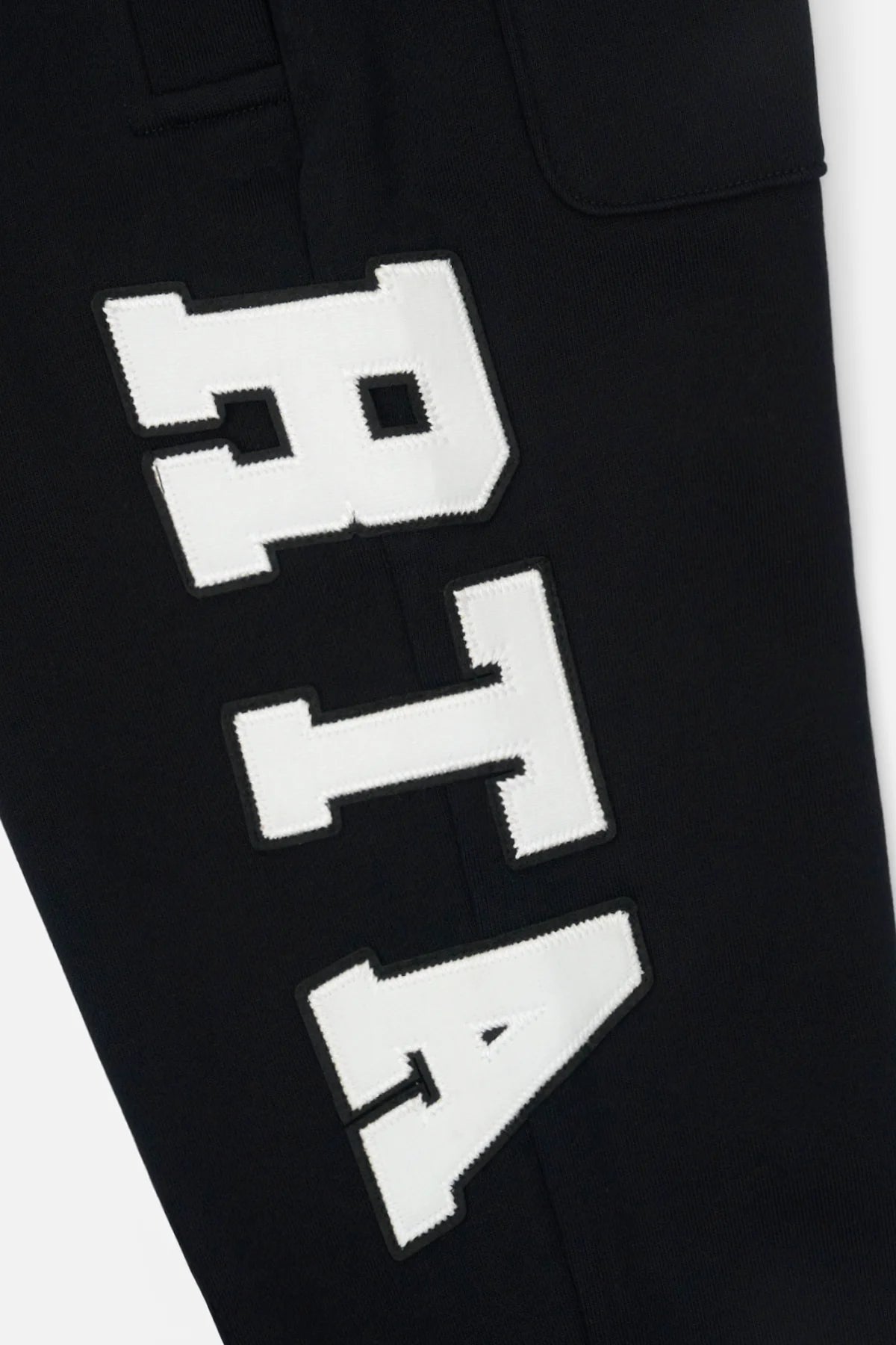 RtA Ewan sweatpant in black collegiate with logo detailing, elasticated waistband, and drawstring closure.