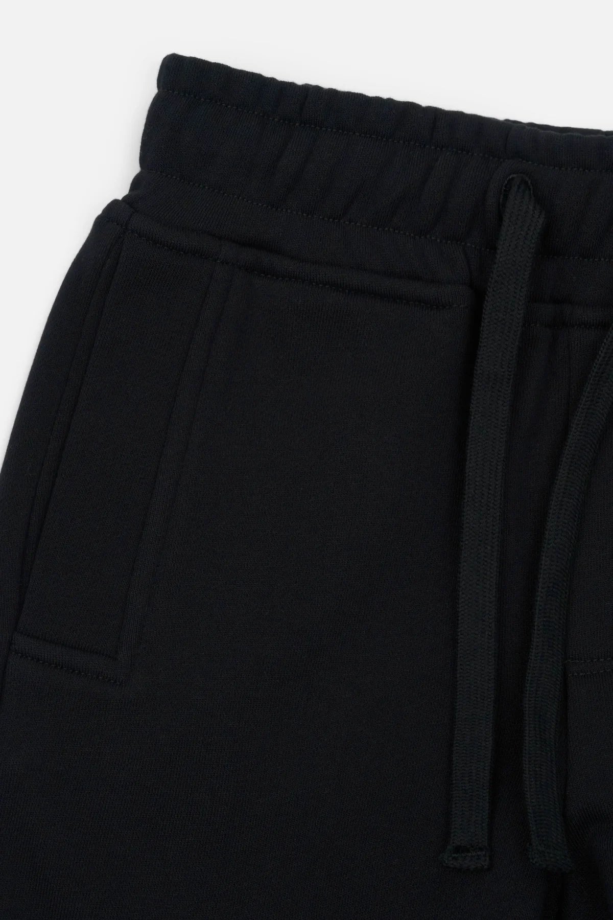 RtA Ewan sweatpant in black collegiate with logo detailing, elasticated waistband, and drawstring closure.