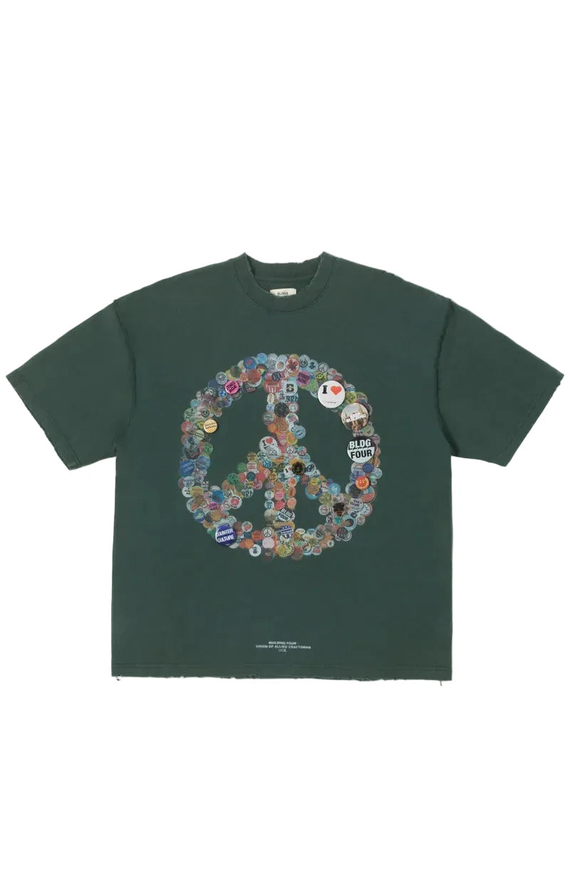 Rockefeller Knit Tee in charcoal with snow-washed finish, peace-sign graphic made from layered buttons, applied metal pins, and distressed detailing