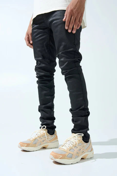SERENEDE® CAVIAR 7 black denim jeans with wax coating, fitted silhouette, five-pocket styling, and branded hardware